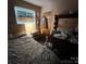 Modest bedroom with hardwood floors featuring a bed, window with natural light, and a dresser at 4414 Birkdale Dr, Charlotte, NC 28208