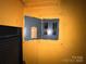 A residential electrical panel is visible, offering protection and distribution of electrical power throughout the house at 4414 Birkdale Dr, Charlotte, NC 28208