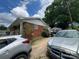Brick exterior home with driveway and plenty of parking at 4414 Birkdale Dr, Charlotte, NC 28208