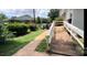 Exterior view of the home featuring ramp and lush green bushes at 4414 Birkdale Dr, Charlotte, NC 28208