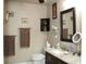 A well-lit bathroom features granite countertops and modern fixtures, offering a comfortable space for personal care at 4711 Lenox Hill Pl # 98, Charlotte, NC 28269