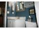 Bathroom featuring a vanity with a marble countertop, a toilet, and tiled walls at 4711 Lenox Hill Pl # 98, Charlotte, NC 28269