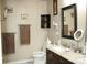 A well-lit bathroom features granite countertops and modern fixtures, offering a comfortable space for personal care at 4711 Lenox Hill Pl # 98, Charlotte, NC 28269