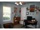 Bedroom with a window that provides a view, decorated with assorted decor and a ceiling fan at 4711 Lenox Hill Pl # 98, Charlotte, NC 28269