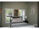 A serene bedroom with natural light provides a relaxing retreat, perfect for relaxation and restful sleep at 4711 Lenox Hill Pl # 98, Charlotte, NC 28269