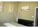 A well-lit bedroom features modern decor, offering a serene setting to unwind and enjoy a good night's sleep at 4711 Lenox Hill Pl # 98, Charlotte, NC 28269