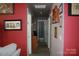Inviting hallway with neutral walls and storage, showcasing a clean, flowing layout perfect for seamless navigation at 4711 Lenox Hill Pl # 98, Charlotte, NC 28269