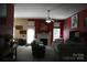 Inviting living room with a cozy fireplace and neutral furniture at 4711 Lenox Hill Pl # 98, Charlotte, NC 28269