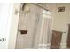 Well-maintained shower stall, complete with modern fixtures and a new shower curtain, ready to provide comfortable experience at 4711 Lenox Hill Pl # 98, Charlotte, NC 28269