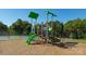 Community playground with green play structure sitting atop a bed of mulch, ready for Gathering fun at 473 Court House Ave, York, SC 29745