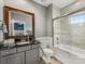 Well-lit bathroom with a tub-shower combo, granite countertop, and ample vanity space at 5030 Waldron Meadow Dr, Charlotte, NC 28226