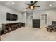 Spacious bonus room with a large TV, comfortable seating, and access to a walk-in closet at 5030 Waldron Meadow Dr, Charlotte, NC 28226