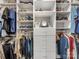 Organized walk-in closet with shelves, drawers, and hanging space for efficient storage at 5030 Waldron Meadow Dr, Charlotte, NC 28226