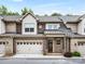 Beautiful brick townhome with an attached garage and a covered front entrance at 5030 Waldron Meadow Dr, Charlotte, NC 28226