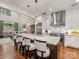 Bright kitchen with stainless steel appliances, granite countertops, and a large island with seating at 5030 Waldron Meadow Dr, Charlotte, NC 28226