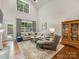 Spacious living room with hardwood floors, large windows and natural light at 5030 Waldron Meadow Dr, Charlotte, NC 28226