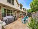 Charming backyard patio with grill and outdoor seating, ideal for summer barbecues and gatherings at 5030 Waldron Meadow Dr, Charlotte, NC 28226