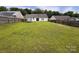 Expansive backyard featuring a trampoline and privacy fence at 5523 Stone Bluff Ct, Charlotte, NC 28214