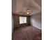 Spacious bedroom featuring a tray ceiling, ceiling fan, neutral walls, and plush carpeting at 5523 Stone Bluff Ct, Charlotte, NC 28214