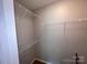 Walk-in closet with wire shelving for organized storage at 5523 Stone Bluff Ct, Charlotte, NC 28214