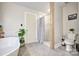 Well-lit bathroom with a standalone tub, separate shower, and modern fixtures at 5611 Charter Oaks Ln, York, SC 29745