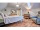 Cozy bedroom featuring hardwood floors, skylight, and vintage wood furniture at 5611 Charter Oaks Ln, York, SC 29745