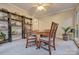 Cozy breakfast nook features tile floors, natural light from the many windows, and views of the wooded surroundings at 5611 Charter Oaks Ln, York, SC 29745