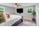 Bright bedroom with a large TV, comfortable bed, and large windows offering ample natural light at 613 Poplar Dr, Shelby, NC 28152