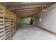 Covered carport area with wooden beams and string lights for added ambiance at 613 Poplar Dr, Shelby, NC 28152