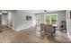 Spacious dining room with hardwood floors, modern decor, and ample natural light at 613 Poplar Dr, Shelby, NC 28152