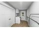 Clean laundry room with washer, dryer, cabinetry, and ample space for laundry tasks at 613 Poplar Dr, Shelby, NC 28152