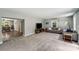 Spacious living room with comfortable seating, a large TV, and seamless flow to the adjacent dining area at 613 Poplar Dr, Shelby, NC 28152