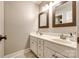 Bright bathroom featuring double sink vanity with framed mirrors and modern fixtures at 701 Larkridge Ct, Rock Hill, SC 29730
