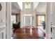 Grand foyer featuring hardwood floors, soaring ceilings, and elegant columns at 701 Larkridge Ct, Rock Hill, SC 29730