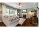 Cozy living room featuring hardwood floors, fireplace, and ample seating at 701 Larkridge Ct, Rock Hill, SC 29730