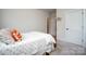 Bedroom featuring neutral walls and carpet and a well-made bed at 711 Beaty St, Davidson, NC 28036
