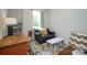 Spare bedroom featuring comfortable seating and a writing desk at 711 Beaty St, Davidson, NC 28036