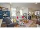 Inviting living room with bright natural light, hardwood flooring, and stylish decor at 711 Beaty St, Davidson, NC 28036