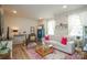 Spacious living room filled with natural light and stylish decor, perfect for relaxation at 711 Beaty St, Davidson, NC 28036