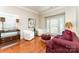 Comfortable living room with hardwood floors, stylish furniture, and lots of natural light at 7211 Baniff Cir, Charlotte, NC 28277