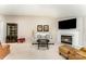 Bright living room with a fireplace, neutral tones, and stylish furnishings at 7211 Baniff Cir, Charlotte, NC 28277