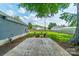 Backyard with a firepit and lounge chairs at 7901 Reames Rd, Charlotte, NC 28216