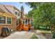 Lovely backyard with a patio and screened-in porch, perfect for relaxing at 7916 Wellston Dr, Charlotte, NC 28210