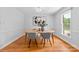 Bright dining room features a modern table setting and minimalist decor at 7916 Wellston Dr, Charlotte, NC 28210