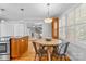 Kitchen with stainless steel appliances, granite counters, and a light-filled dining area at 7916 Wellston Dr, Charlotte, NC 28210