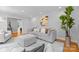 Spacious living room featuring a neutral color palette, hardwood floors, and stylish furniture at 7916 Wellston Dr, Charlotte, NC 28210