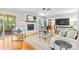 Bright living room featuring hardwood floors, fireplace, and stylish furnishings at 7916 Wellston Dr, Charlotte, NC 28210