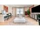 Bright living room with large window, plush seating, and modern decor at 7930 Rolling Wheels Rd, Charlotte, NC 28215