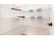 Organized pantry featuring white wire shelving for ample storage space at 7930 Rolling Wheels Rd, Charlotte, NC 28215