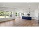 Bright, open kitchen with a large navy island, stainless appliances, and lots of natural light at 8632 Cedarbrook Dr, Charlotte, NC 28215